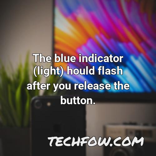 the blue indicator light hould flash after you release the button