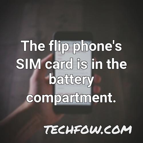 the flip phone s sim card is in the battery compartment