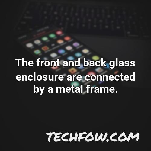 the front and back glass enclosure are connected by a metal frame