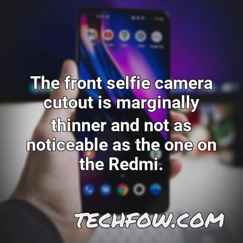 the front selfie camera cutout is marginally thinner and not as noticeable as the one on the redmi