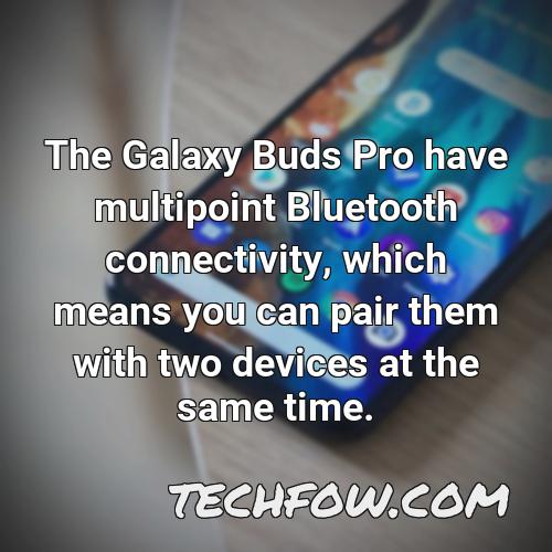 the galaxy buds pro have multipoint bluetooth connectivity which means you can pair them with two devices at the same time