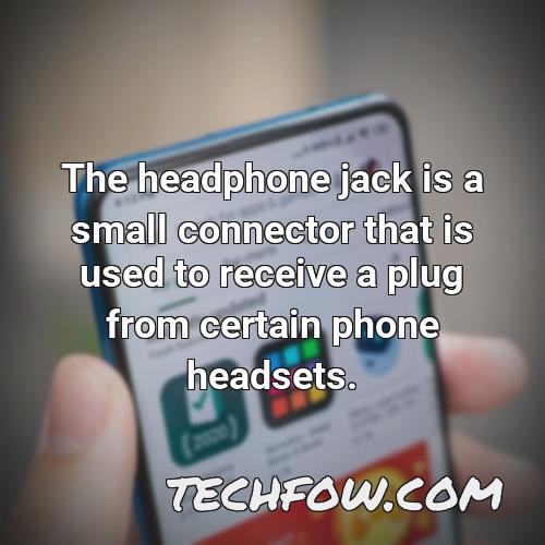 the headphone jack is a small connector that is used to receive a plug from certain phone headsets