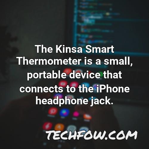 the kinsa smart thermometer is a small portable device that connects to the iphone headphone jack