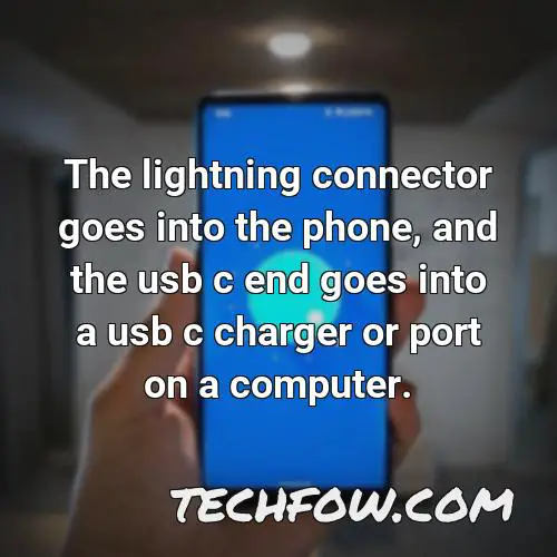 the lightning connector goes into the phone and the usb c end goes into a usb c charger or port on a computer