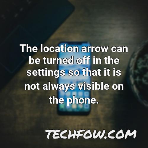 the location arrow can be turned off in the settings so that it is not always visible on the phone