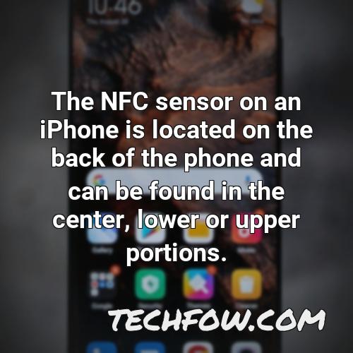 the nfc sensor on an iphone is located on the back of the phone and can be found in the center lower or upper portions