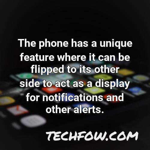 the phone has a unique feature where it can be flipped to its other side to act as a display for notifications and other alerts