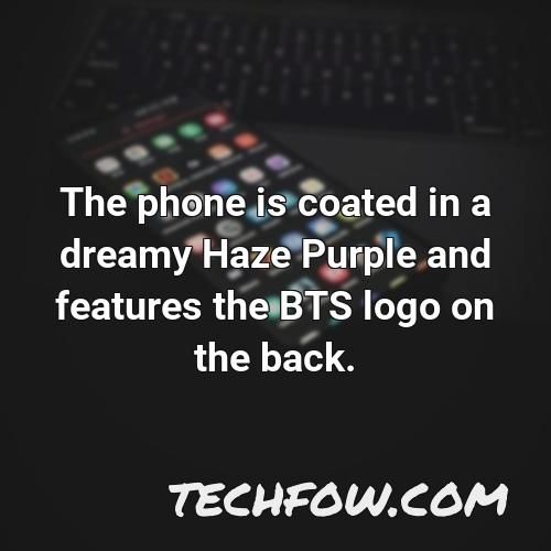 the phone is coated in a dreamy haze purple and features the bts logo on the back