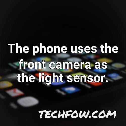 the phone uses the front camera as the light sensor