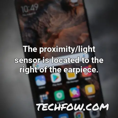 the proximity light sensor is located to the right of the earpiece