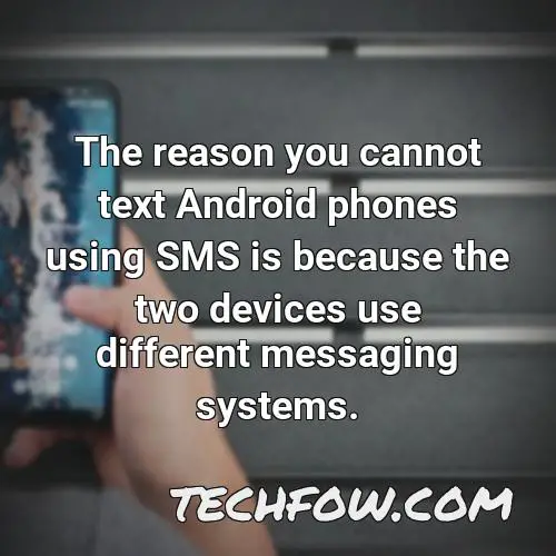 the reason you cannot text android phones using sms is because the two devices use different messaging systems