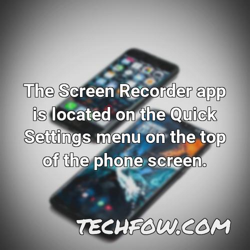 the screen recorder app is located on the quick settings menu on the top of the phone screen