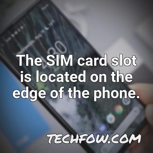 the sim card slot is located on the edge of the phone