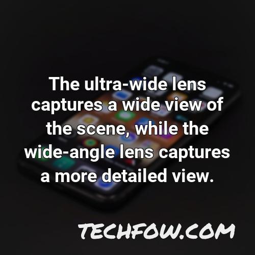 the ultra wide lens captures a wide view of the scene while the wide angle lens captures a more detailed view