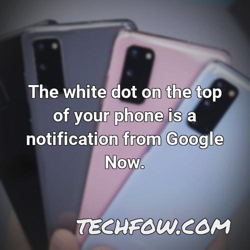 the white dot on the top of your phone is a notification from google now
