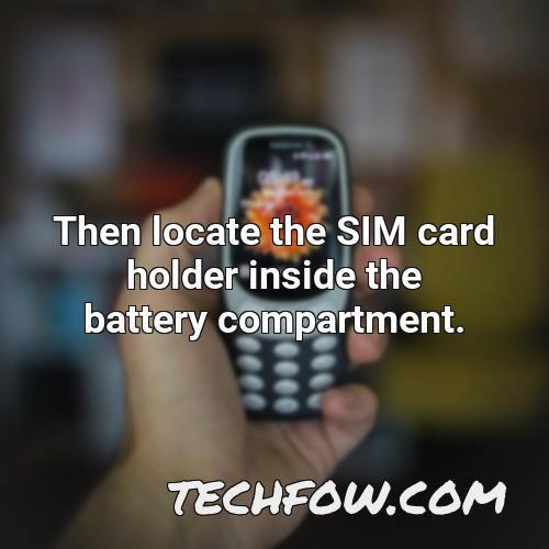 then locate the sim card holder inside the battery compartment