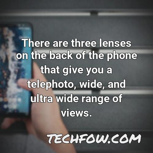 there are three lenses on the back of the phone that give you a telephoto wide and ultra wide range of views