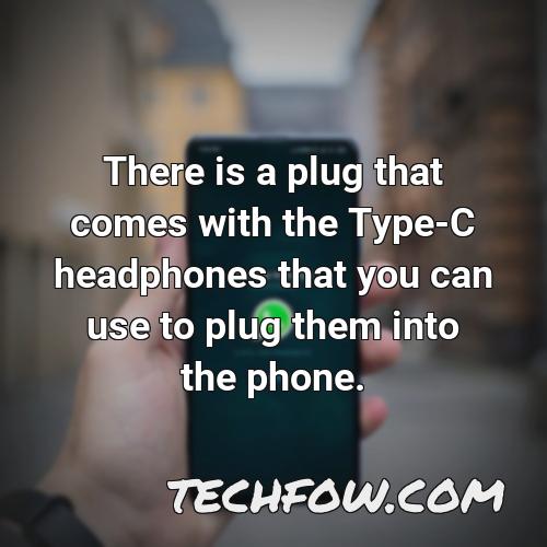 there is a plug that comes with the type c headphones that you can use to plug them into the phone