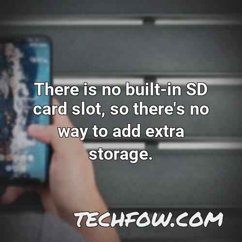 there is no built in sd card slot so there s no way to add extra storage