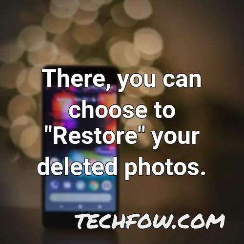 there you can choose to restore your deleted photos