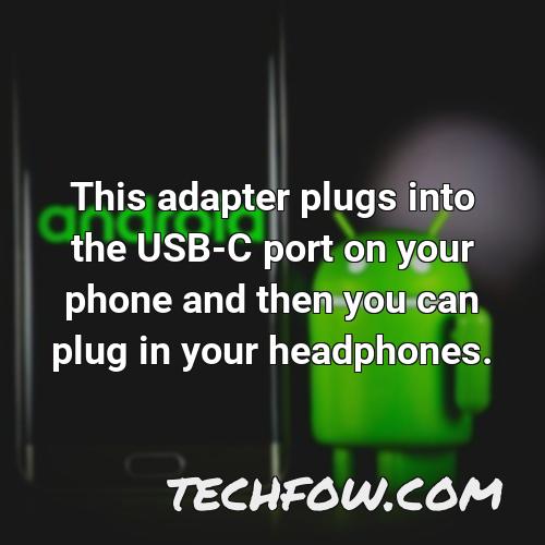this adapter plugs into the usb c port on your phone and then you can plug in your headphones