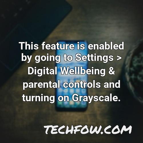 this feature is enabled by going to settings digital wellbeing parental controls and turning on grayscale