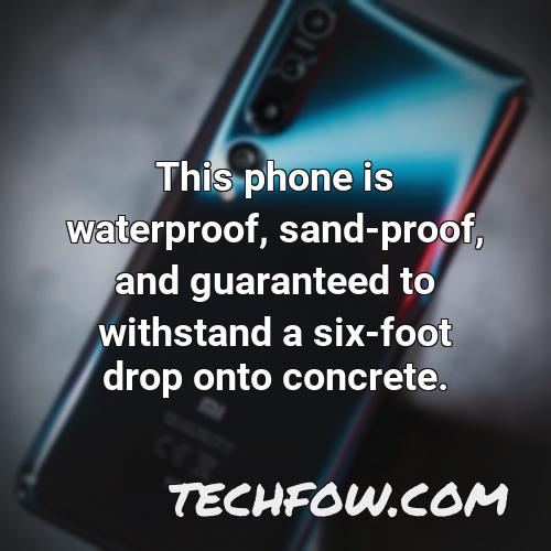 this phone is waterproof sand proof and guaranteed to withstand a six foot drop onto concrete