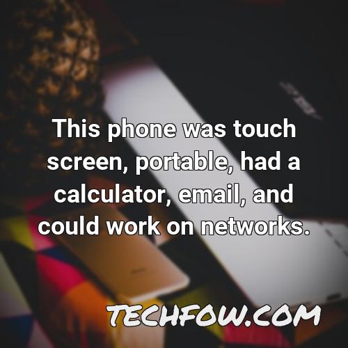 this phone was touch screen portable had a calculator email and could work on networks