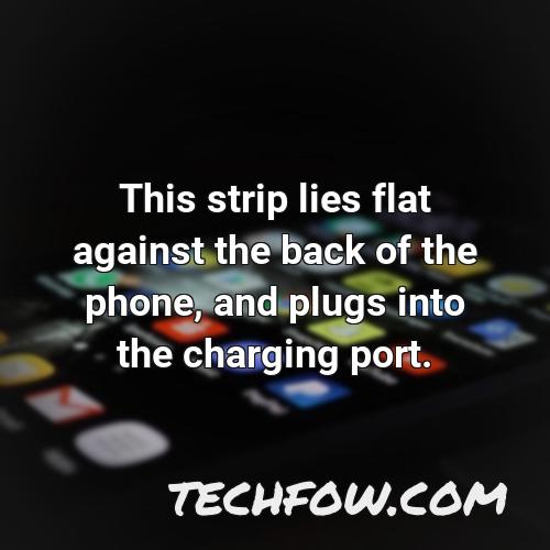 this strip lies flat against the back of the phone and plugs into the charging port
