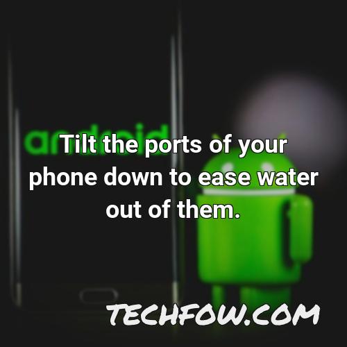 tilt the ports of your phone down to ease water out of them