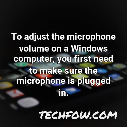 to adjust the microphone volume on a windows computer you first need to make sure the microphone is plugged in