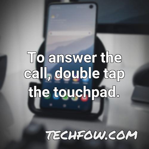 to answer the call double tap the touchpad