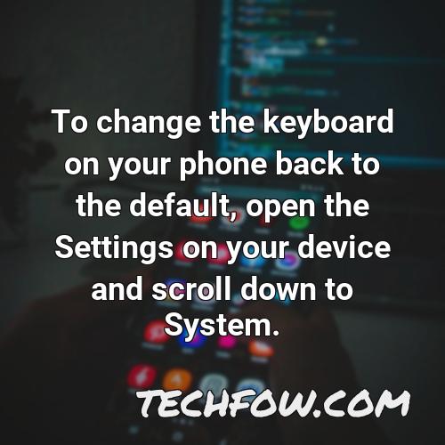 to change the keyboard on your phone back to the default open the settings on your device and scroll down to system