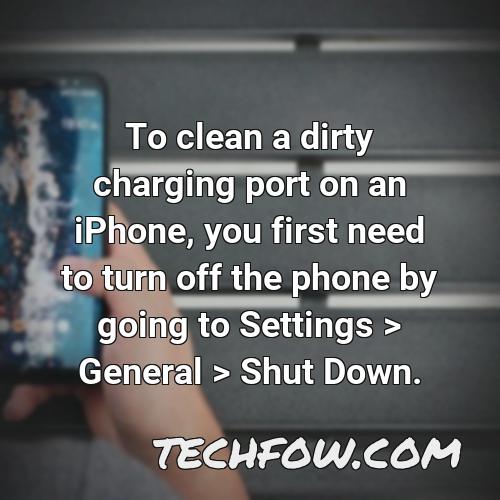 to clean a dirty charging port on an iphone you first need to turn off the phone by going to settings general shut down