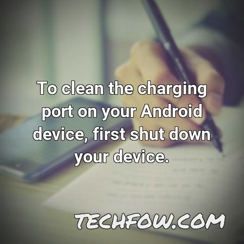 to clean the charging port on your android device first shut down your device