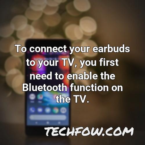 to connect your earbuds to your tv you first need to enable the bluetooth function on the tv