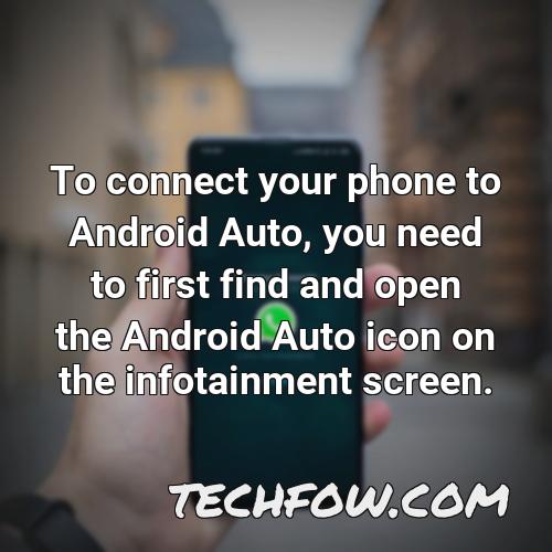 to connect your phone to android auto you need to first find and open the android auto icon on the infotainment screen