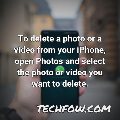 to delete a photo or a video from your iphone open photos and select the photo or video you want to delete