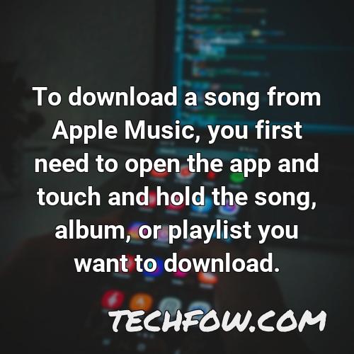 to download a song from apple music you first need to open the app and touch and hold the song album or playlist you want to download