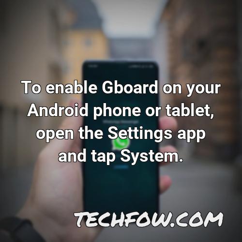 to enable gboard on your android phone or tablet open the settings app and tap system