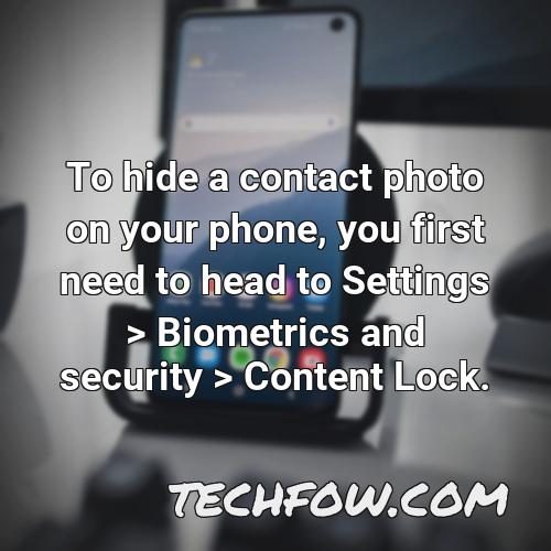 to hide a contact photo on your phone you first need to head to settings biometrics and security content lock