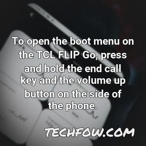 to open the boot menu on the tcl flip go press and hold the end call key and the volume up button on the side of the phone