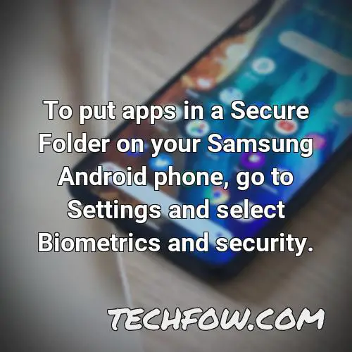 to put apps in a secure folder on your samsung android phone go to settings and select biometrics and security