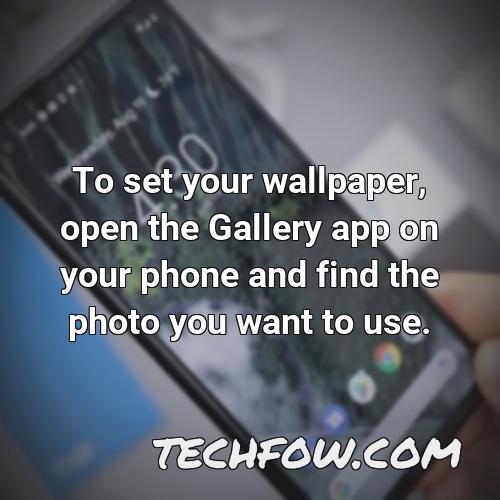 to set your wallpaper open the gallery app on your phone and find the photo you want to use