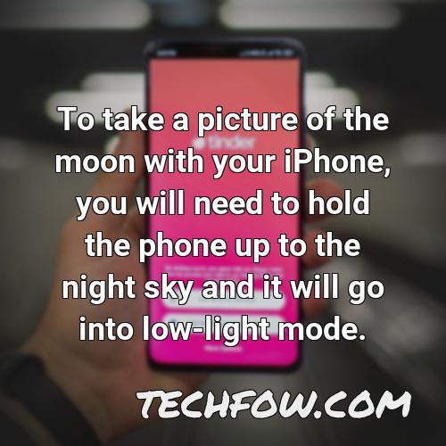 to take a picture of the moon with your iphone you will need to hold the phone up to the night sky and it will go into low light mode