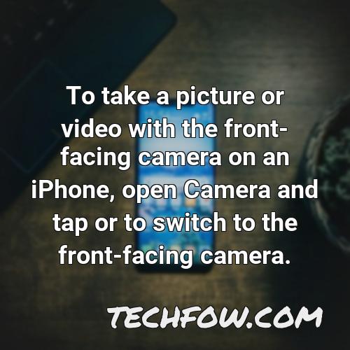 to take a picture or video with the front facing camera on an iphone open camera and tap or to switch to the front facing camera