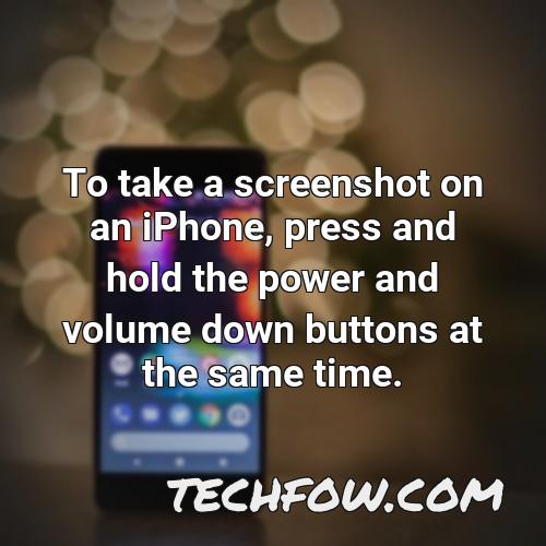 to take a screenshot on an iphone press and hold the power and volume down buttons at the same time