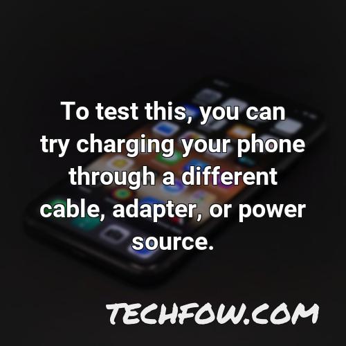 to test this you can try charging your phone through a different cable adapter or power source