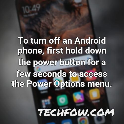 to turn off an android phone first hold down the power button for a few seconds to access the power options menu