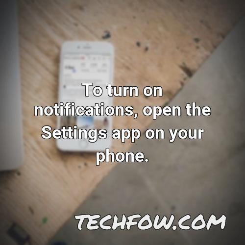 to turn on notifications open the settings app on your phone